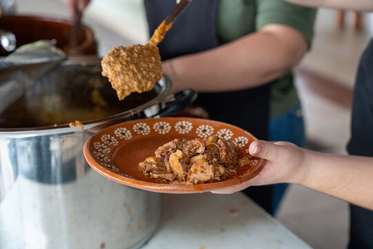 Tatemada birria served at a traditional stall in the central market of Guadalajara, Jalisco, Mexico. abastos, tapatio, chivo