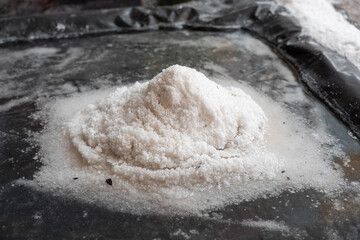 Evaporation pond of seawater at the Salinas de Cuyutlán, Colima, used for artisan salt production. Reflects the traditional process, the salt industry, and the local production of the resource.
