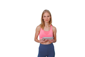 Healthy woman using a tablet for fitness and workout, looking at something on screen, transparent background