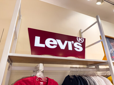 Illuminated sign with the Levis logo, owned by Levi Strauss and Co. inside a department store. iconic clothing brand, jeans, and denim fashion. Jalisco, Mexico, Nov. 2, 2025.