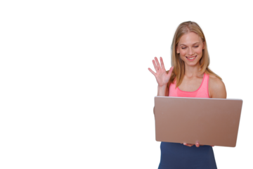 Woman waving hello during video call on laptop communicating online about fitness, exercise, and healthy lifestyle