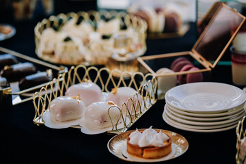 Elegant dessert buffet serving sweet pastries and cakes