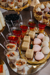 Dessert buffet table offering variety of sweet treats