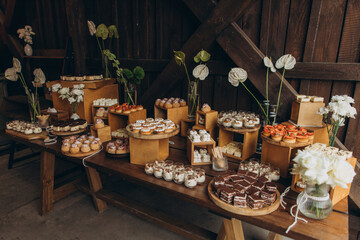 Dessert buffet table offering sweet treats for guests