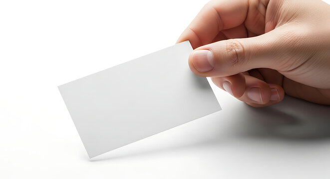 A hand holding a blank business card for contact details or custom design 