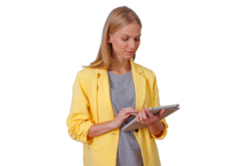 Businesswoman using digital tablet for work, managing new ideas, wearing yellow blazer, showing technology concept on transparent background