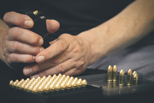 Loading pistol and manipulating with semiautomatic 9 mm pistol details