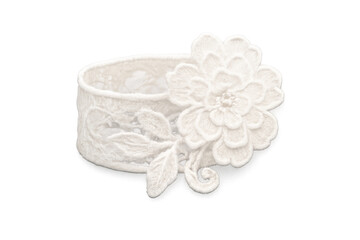 Obraz premium White lace bracelet with floral embroidery on transparent background