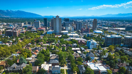 Aerial Downtown Salt Lake City Utah With Wasatch Mountains And Urban Skyline