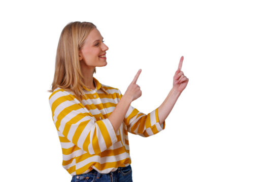 Happy young woman pointing with both index fingers up and to the side, presenting or indicating something on transparent background