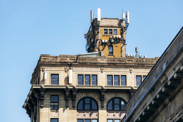 Montreal, Canada - August 11, 2025: Corporative building at Rue Saint-Gabriel in Old Montreal with stately facade and blue sky