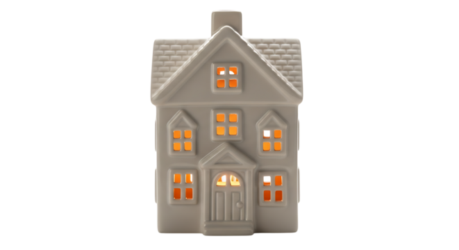 Charming gray ceramic house with warm light glowing from the windows, a cozy home decor accent piece or nightlight isolated on a white background