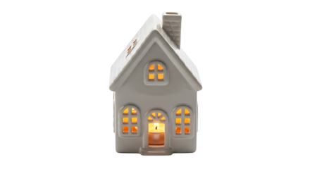 Charming gray ceramic miniature house with warm glowing windows, a cozy home decoration and night light isolated on a white background