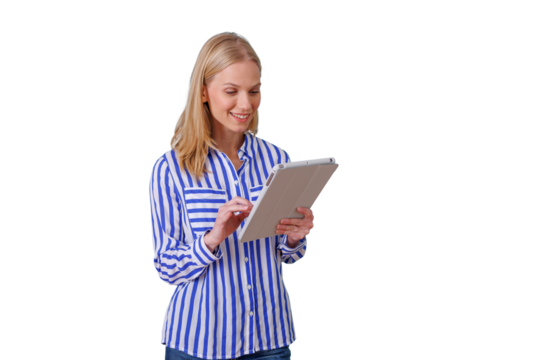 Woman standing, holding and interacting with a tablet, smiling and looking at the screen. Transparent background