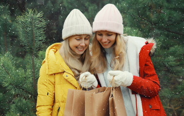 Christmas happy smiling women friends have fun, celebration in winter, joyful girlfriends together