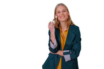 Young blonde woman smiling, applying blush with makeup brush, showcasing beauty and cosmetics routine
