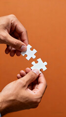 hand holding puzzle piece