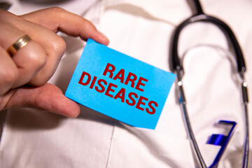 Stethoscope and white card with RARE DISEASES text