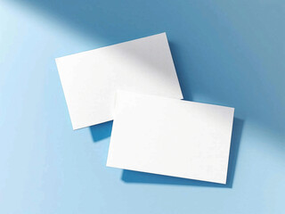 White blank cards on blue background with soft shadows
