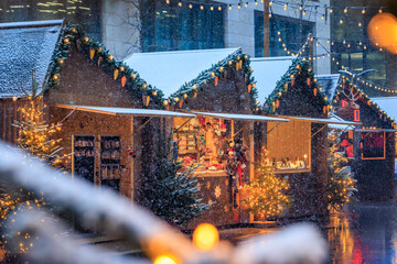 Twinkling lights and snowfall at the Zurich Christmas Market, Switzerland, bokeh