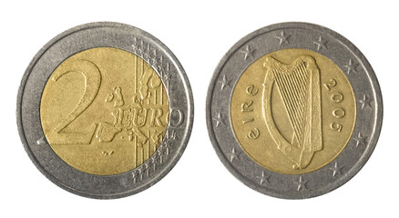 Isolated photo of 2 euro Ireland 2005 bi-metallic coin obverse and reverse on white background.