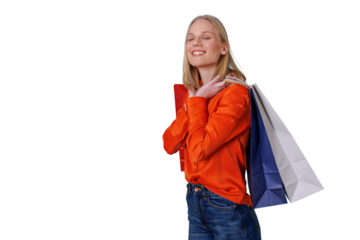 Happy woman enjoying retail therapy, carrying colorful shopping bags on transparent background
