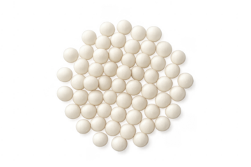 Many white round pills on transparent background