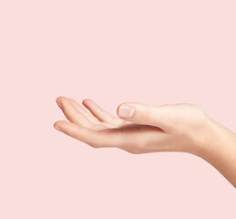 woman's hand holding something, object