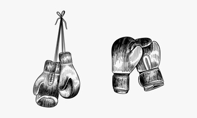 Boxing gloves hanging on the wall. Black and white ink illustration