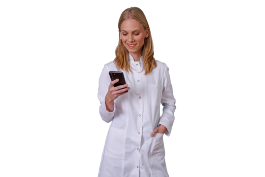 Medical professional standing, smiling while checking phone, connecting with digital health, modern communication in healthcare, transparent background - Powered by Adobe