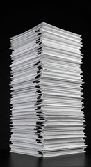 Huge towering stack of white documents and folders creating an administrative burden on a desk, symbolizing excessive workload and bureaucracy ,blank ,demanding ,folders