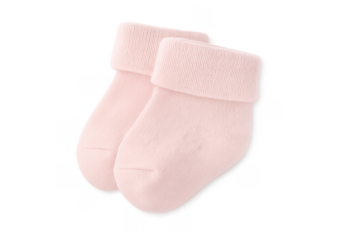 Pink baby socks for newborn infant on transparent background