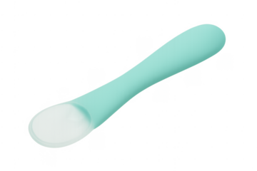 Silicone baby feeding spoon holding a white cream