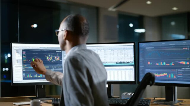 Business professional analyzing realtime data on multiple screens optimizing decisions through instant analytics in a hightech office environment.