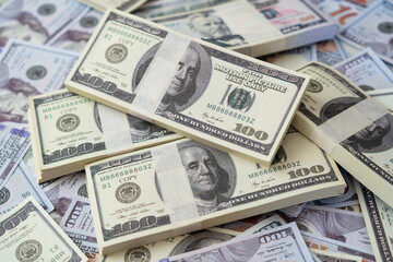 stack of 100 dollar bills