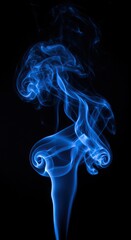 Abstract blue smoke flow captured against a dark background, showing swirling fluid movement, vibrant color, and mysterious shapes ,flowing ,smooth ,vibrant