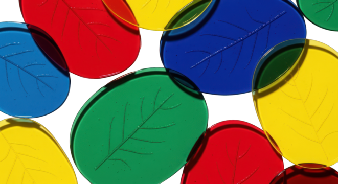 Colorful leaf shapes overlapping on white background.