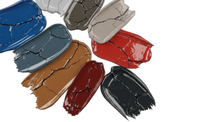 Colorful paint swatches on a white background showcasing various shades and textures.