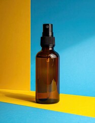 Amber spray bottle on yellow and blue