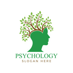 Green silhouette of a head with tree branches and leaves, representing psychology, mental health, and personal growth