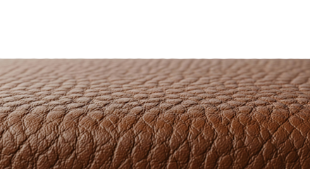Detailed macro shot of premium brown genuine leather texture, revealing its natural grain and sophisticated material surface