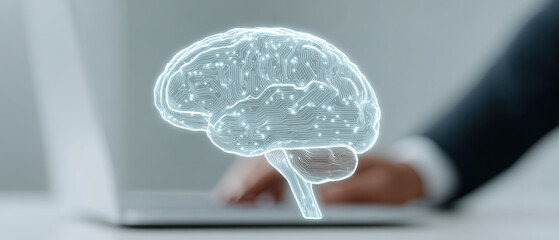 Artificial Intelligence Concept: Glowing Brain Circuit Board Overlayed on Person Typing on Laptop, Representing Machine Learning, Data Processing, Neural Networks, and Future Technology