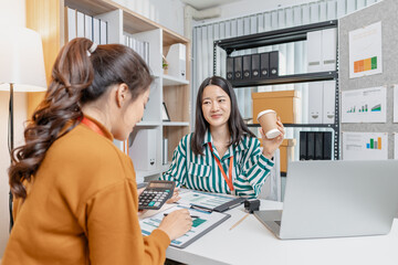 A group of professionals engaged in a collaborative business meeting, exchanging innovative ideas and strategies to build growth and success in a modern startup environment.