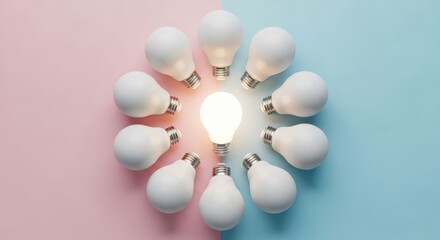 Arrangement of light bulbs on a split pink and blue background with one bulb illuminated brightly