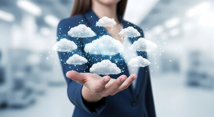 A businesswoman's hand cradles digital cloud computing elements, symbolizing data storage and technology's innovative advancements in a modern office environment.