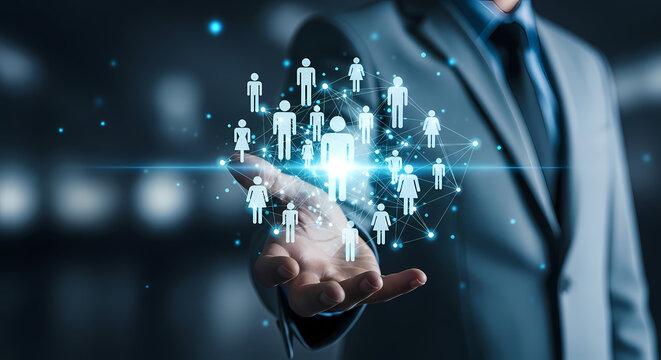 A businessman's hand holds a glowing network of people, representing human resources and business connections in a digital world.