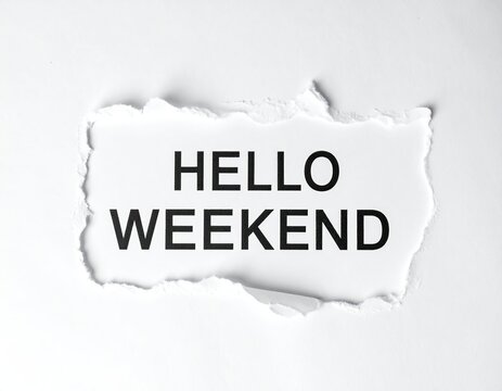 Ripped paper revealing "HELLO WEEKEND" message