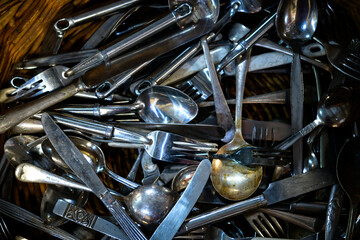 many pieces of old silver cutlery - horizontal