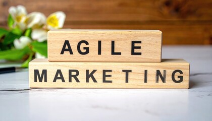 Agile Marketing text on wood blocks, floral backdrop