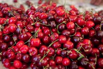 bundle of red cherries in a market